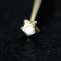 Piercing 18k Gold Star 0750 with a Zirconia Stone