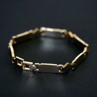 Brazalete de acero chapado en oro 19cm