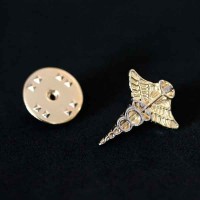 Bottom Broche Folheado a Ouro Optometria