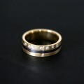 AlianaAnatmicadeOuro18k750eOuroBranco18k0750Largura5.9mmEspessura1.5mmcom7Diamantesde1Pontos