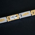 Pulseira de Aço com Detalhes em Ouro Amarelo Pulseira de Aço com Detalhes em Ouro Amarelo