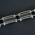 Worked Steel Bracelet with Leather Details