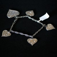 Steel Bracelet Twisted Heart a great job and 4 Small Hearts