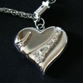 Steel Bracelet Twisted Heart a great job and 5 Small Hearts